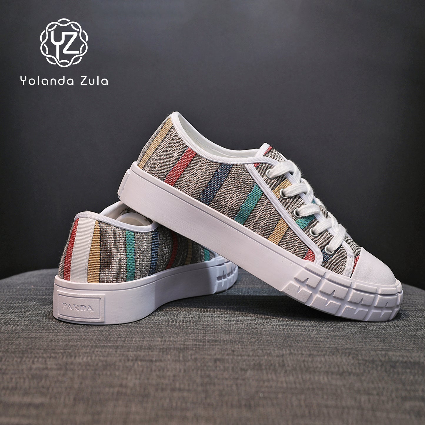Gray sole colored striped canvas shoes
